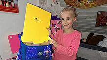 Mila Sautter aus Aach-Linz packt schon ihren Ranzen für das neue Schuljahr. Die Siebenjährige gibt Erstklässlern Tipps, wie sie sich im ...