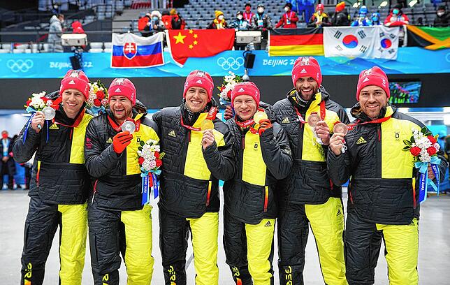 Dreifachsieg (von links): Die Silbermedaillengewinner Florian Bauer und Johannes Lochner, die Goldmedaillengewinner Thorsten Margis und ...