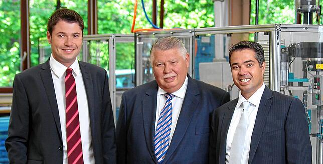 Firmengründer Albert Metz mit seinen Söhnen Christian (links) und Jochen.