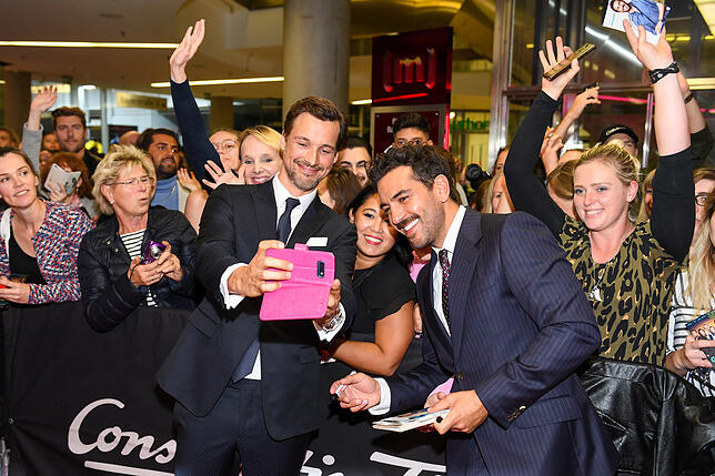 Die Schauspieler Florian David Fitz (vorne links) und Elyas M&lsquo;Barek sind bei der Premiere von &bdquo;Das perfekte Geheimnis&ldquo; ...