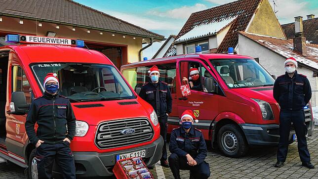 Von links auf dem Bild: Der stellvertretende Abteilungskommandant Kernstadt Markus Rebholz, Patrick Bach, Abteilungskommandant Kernstadt ...