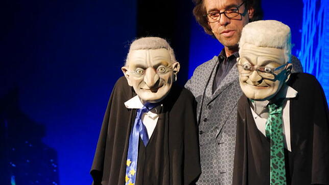 Christoph Sonntag als Bauchredner beim „Sonntagsgespräch“: Günther Oettinger und Winfried Kretschmann als Handpuppen.