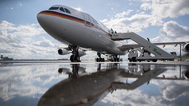 TOPSHOT – The "Konrad Adenauer" Airbus A340 waits to take German Chancellor Angela Merkel to Washington for talks with US President ...