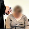 Freiburg: Die wegen Kindesmissbrauchs angeklagte Mutter in einem Saal des Landgerichts.