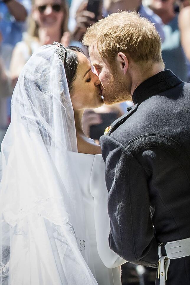 Der erste Kuss als verheiratetes Paar: Meghan und Harry am 19. Mai 2018 in Windsor.