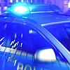 Ein Streifenwagen der Polizei mit eingeschaltetem Blaulicht (Symbolbild).