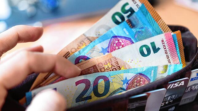 Bild : Über Münzen und Geldscheine mit Corona anstecken? Warum Experten das für unwahrscheinlich halten