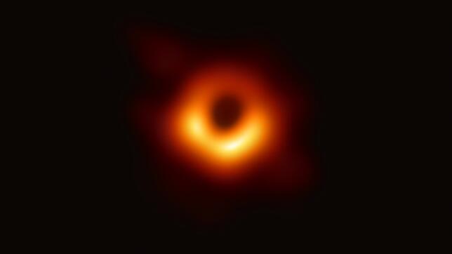 Eine sensationelle Leistung der Astronomen und Physiker: Dieses Bild ist der erste direkte visuelle Nachweis eines Schwarzen Lochs. Es ...